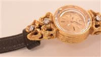 Lot 699 - An Omega 18k cocktail watch.