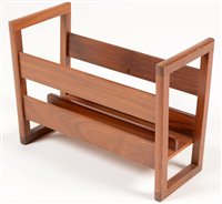 Lot 1098 - A teak magazine rack