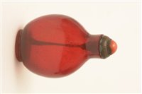 Lot 57 - A 19th Century Chinese amber glass snuff bottle