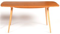 Lot 1140 - Ercol: an elm and beech Windsor style dining table.