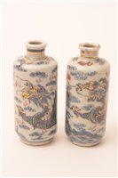 Lot 23 - A pair of 20th Century Chinese porcelain snuff bottle