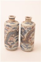 Lot 23 - A pair of 20th Century Chinese porcelain snuff bottle
