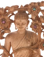 Lot 97 - An Asian carved ivory Buddha.