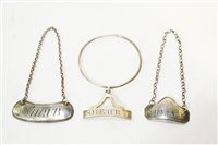 Lot 653 - Three decanter labels