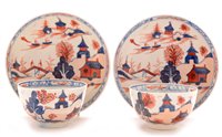 Lot 100 - 18th Century pair of Lowestoft Redgrave dolls house pattern tea bowls and saucers