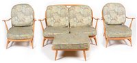Lot 1078 - Ercol: a Windsor light beech four-piece suite.