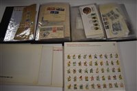 Lot 48 - Two albums of Swaziland stamps and an album of American commemorative stamps.