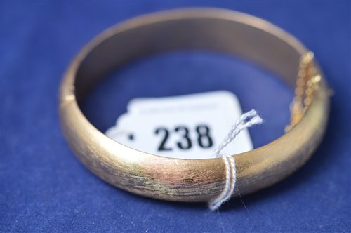 Lot 238 - Yellow metal bangle