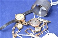 Lot 253 - Four watches and napkin ring