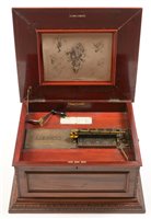 Lot 135 - Regina musical box and disks.