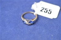 Lot 255 - Sapphire and diamond ring