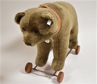 Lot 1125 - Steiff Bear on Wheels