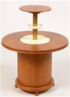 Lot 1100 - A circular cocktail table.