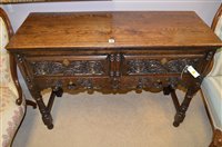 Lot 710 - A side table.