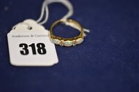 Lot 318 - Opal and diamond ring