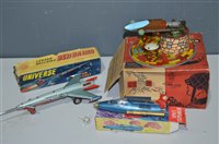 Lot 1076 - Tin plate rockets