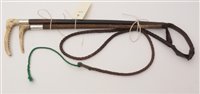 Lot 182 - Two riding whips