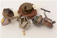 Lot 74 - Two ambidex number one casting reels, and two others