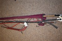 Lot 187 - Riding whips and a fishing rod