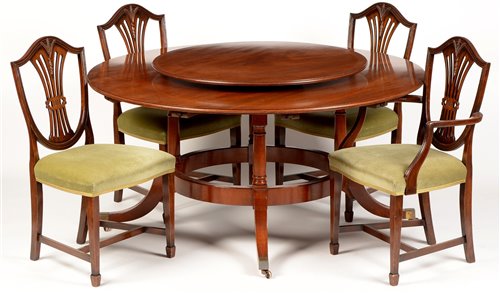 Lot 719 - Chapmans 'Siesta' dining table., cabinet and twelve matching chairs