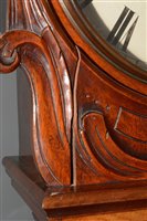 Lot 682 - L. Lesh, Glasgow: a Victorian figured walnut longcase clock.