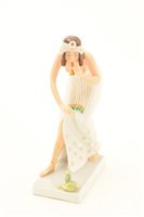 Lot 153 - A Rosenthal porcelain figure of a snake charmer.
