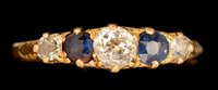 Lot 489 - Sapphire and diamond ring