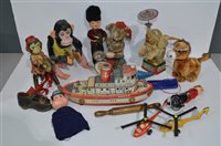 Lot 1103 - Clockwork tinplate toys