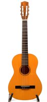 Lot 164 - A Hokada three-quarte size classical guitar.