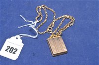 Lot 202 - 9ct gold pendant and yellow metal chain