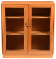 Lot 64 - Ercol small glazed bookcase.