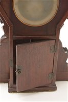 Lot 676 - A rare and unusual Japanese carved mantel clock.