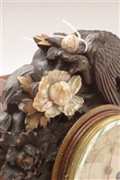 Lot 676 - A rare and unusual Japanese carved mantel clock.
