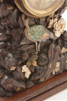 Lot 676 - A rare and unusual Japanese carved mantel clock.