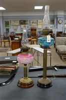 Lot 555 - Two oil lamps