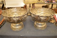 Lot 604 - Pair of white metal wine holders