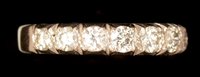 Lot 536 - Half hoop eternity diamond ring