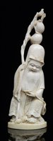 Lot 62 - A Japanese okimono.