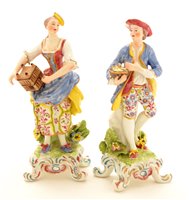 Lot 70 - Pair of Samson porcelain figures.