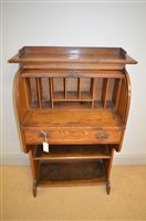 Lot 830 - Oak roll top bureau