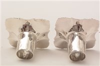 Lot 422 - A pair of George III candlesticks.
