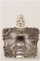Lot 422 - A pair of George III candlesticks.