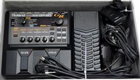 Lot 85 - A Roland GR20 guitar synthesizer.