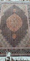 Lot 570 - Tabriz rug