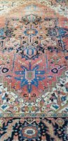 Lot 571 - Heriz carpet