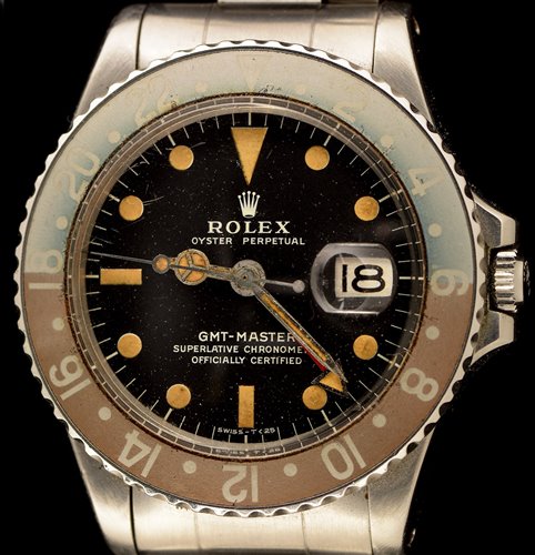 Lot 469 - Rolex GMT Master: a gentleman's stainless steel bracelet watch.