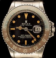 Lot 469 - Rolex GMT Master: a gentleman's stainless steel bracelet watch.