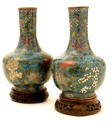 Lot 34 - A pair of Chinese cloisonne bottle vases.