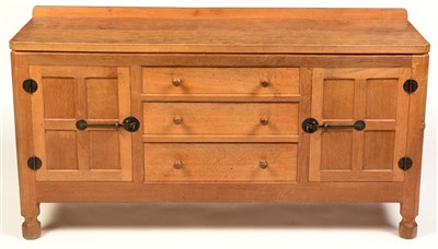 Lot 857 - Robert "Mouseman" Thompson, Kilburn: an oak sideboard.