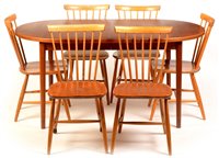 Lot 79 - Sideboard, table and eight chairs.
